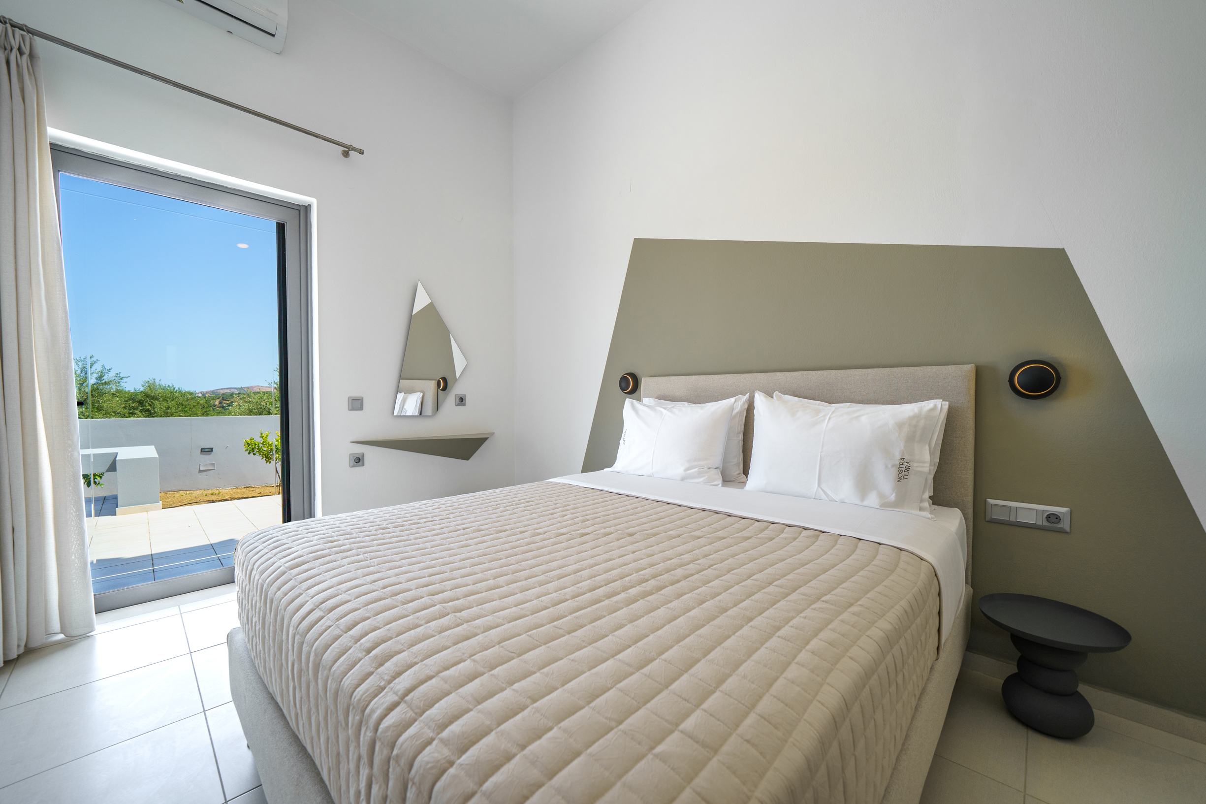 The third bedroom of the Villa features a queen size bed and direct access to the terrace.