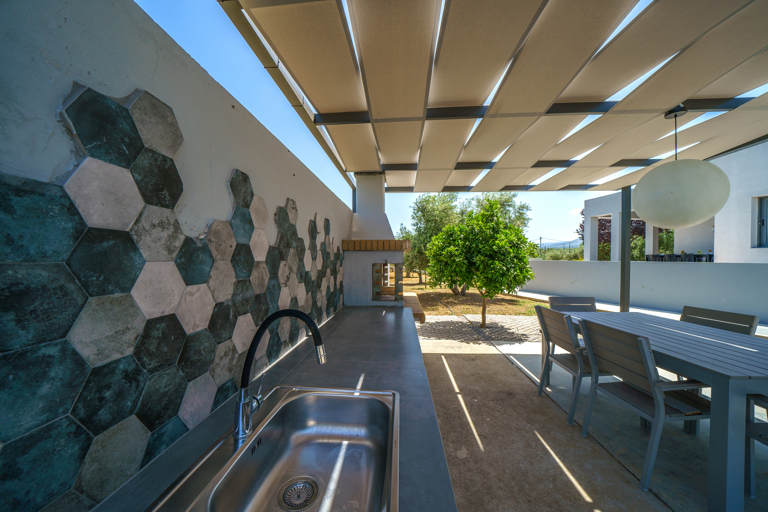 Inviting BBQ settings featuring a sink.